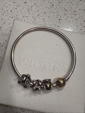 14k gold clasp Pandora bracelet and charms